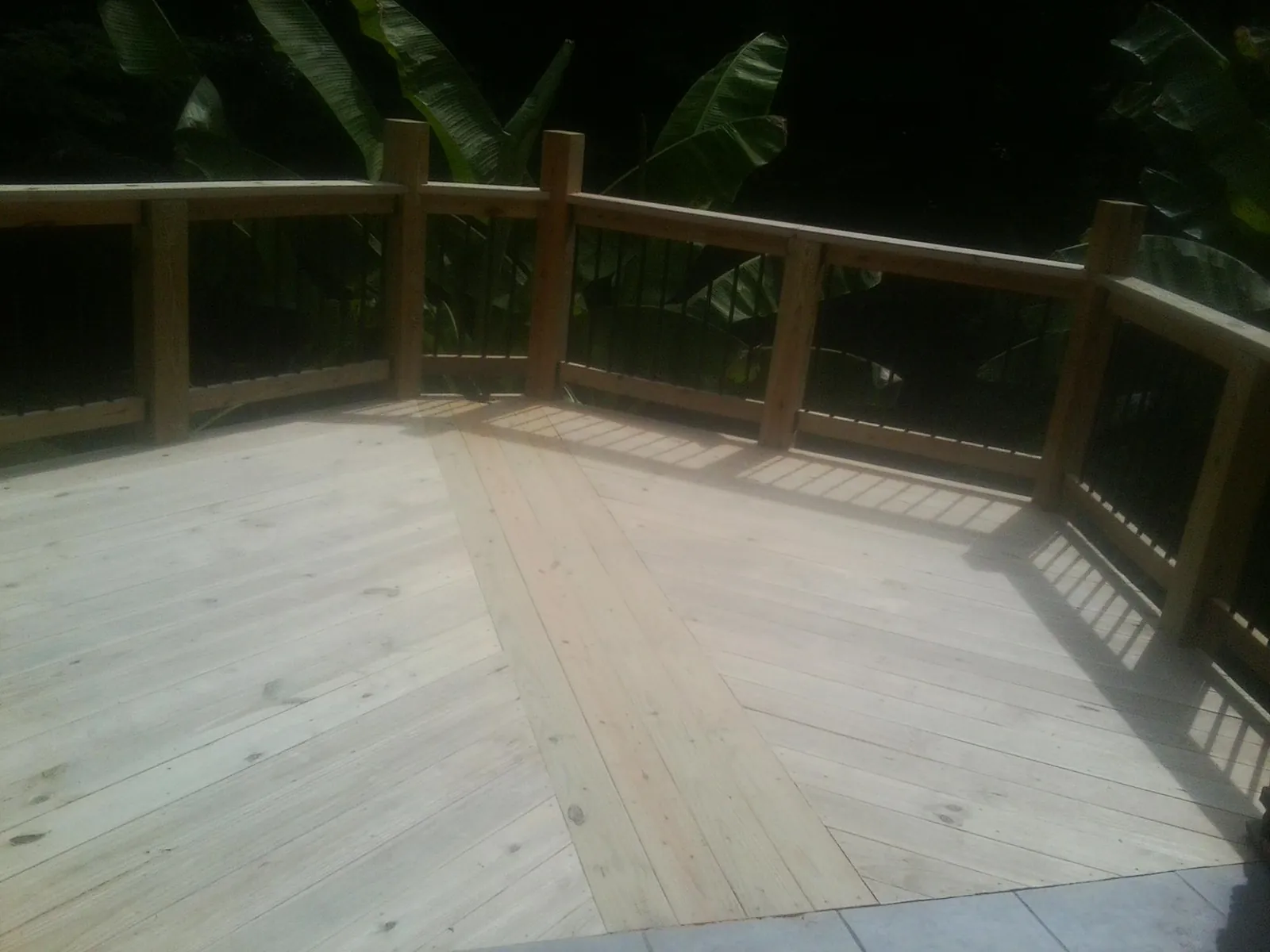 New wood deck and railing built off the back of a home in Warrenton